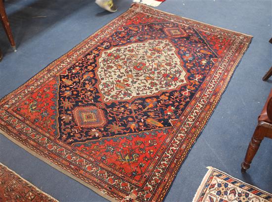 A Shiraz cream ground medallion rug, 196cm x 134cm